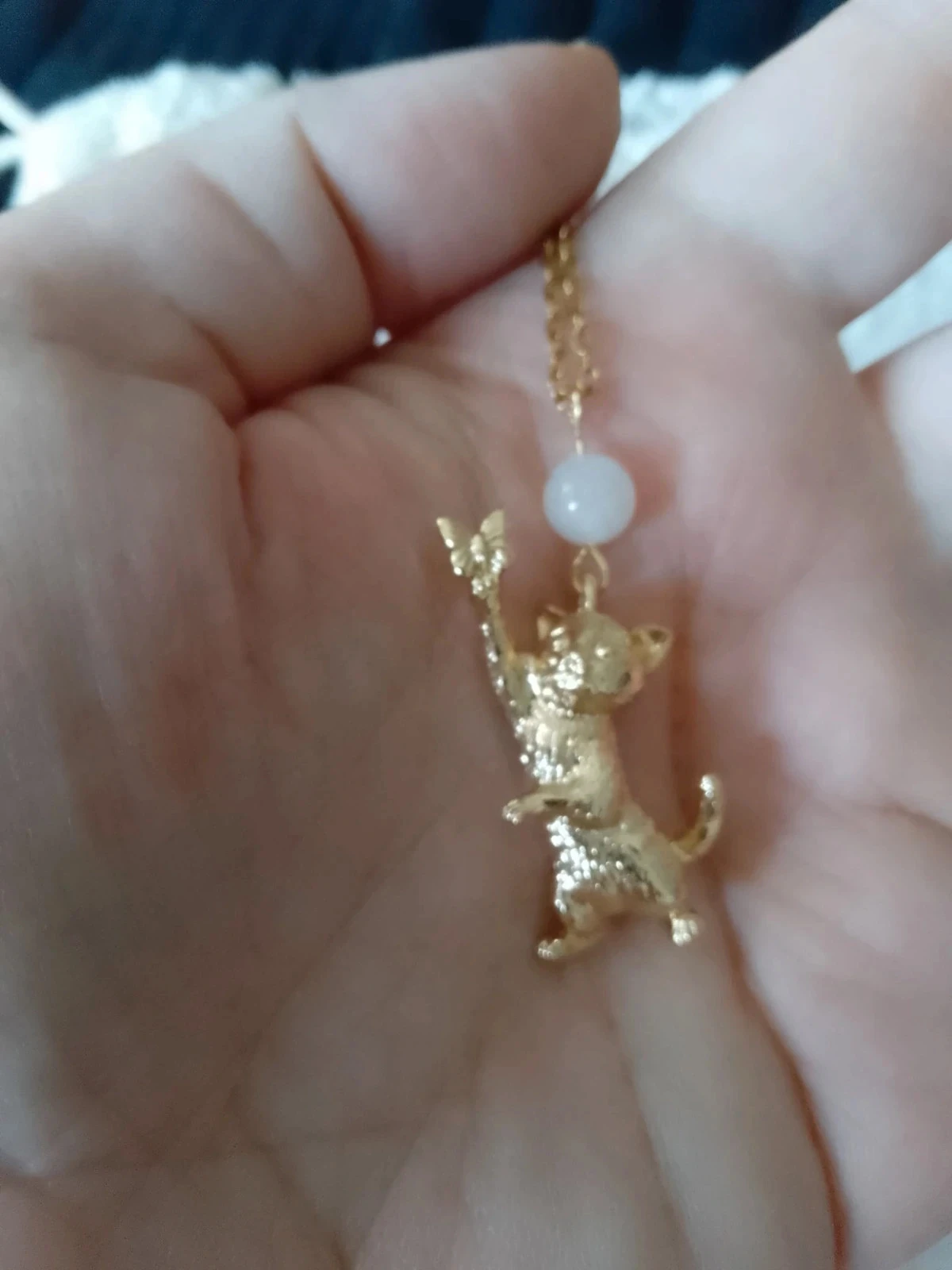 Golden butterfly cat necklace with white moonstone – photo 3